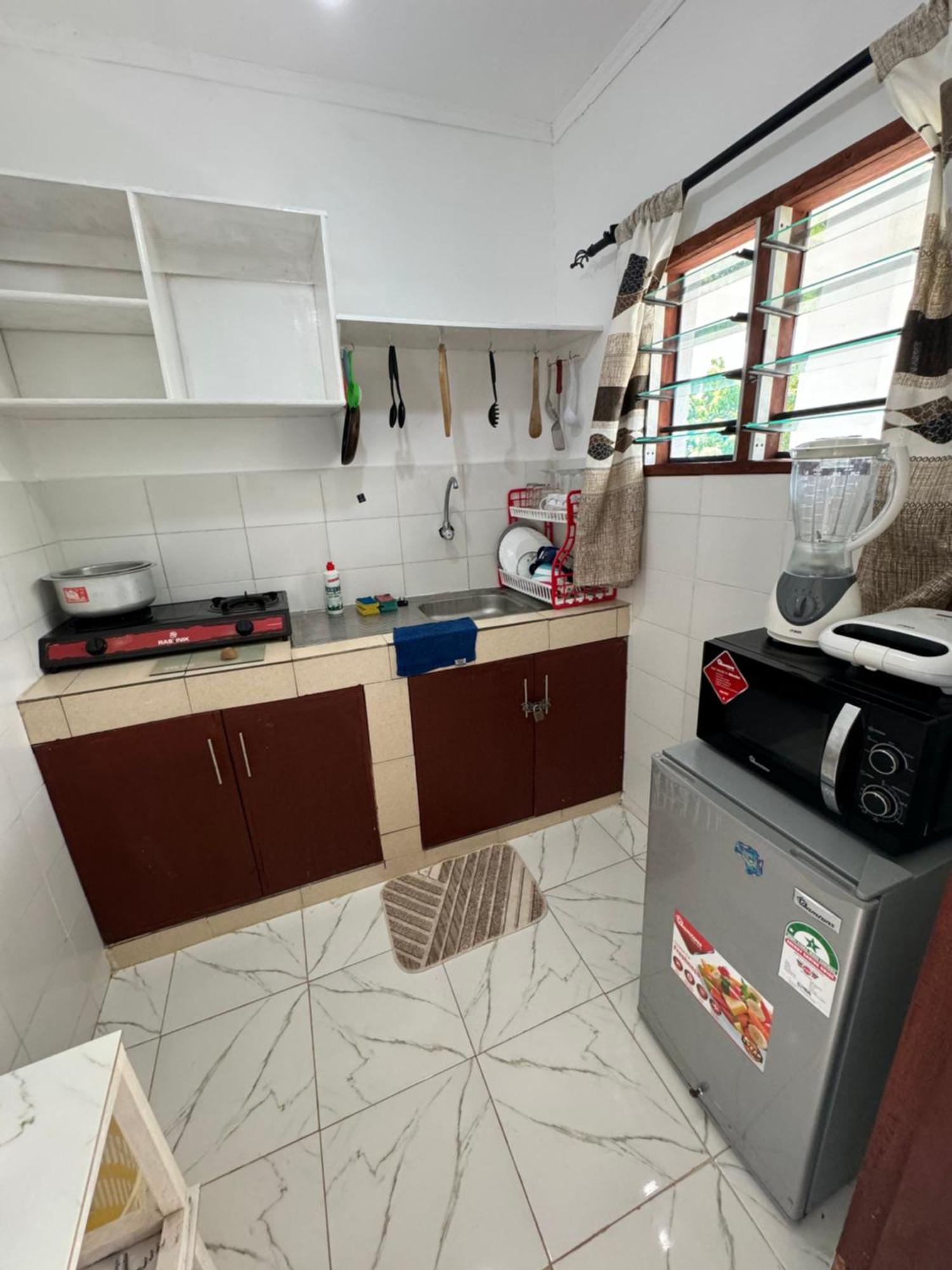 Ocean Paradise Beach Apartment Galu Bagian luar foto